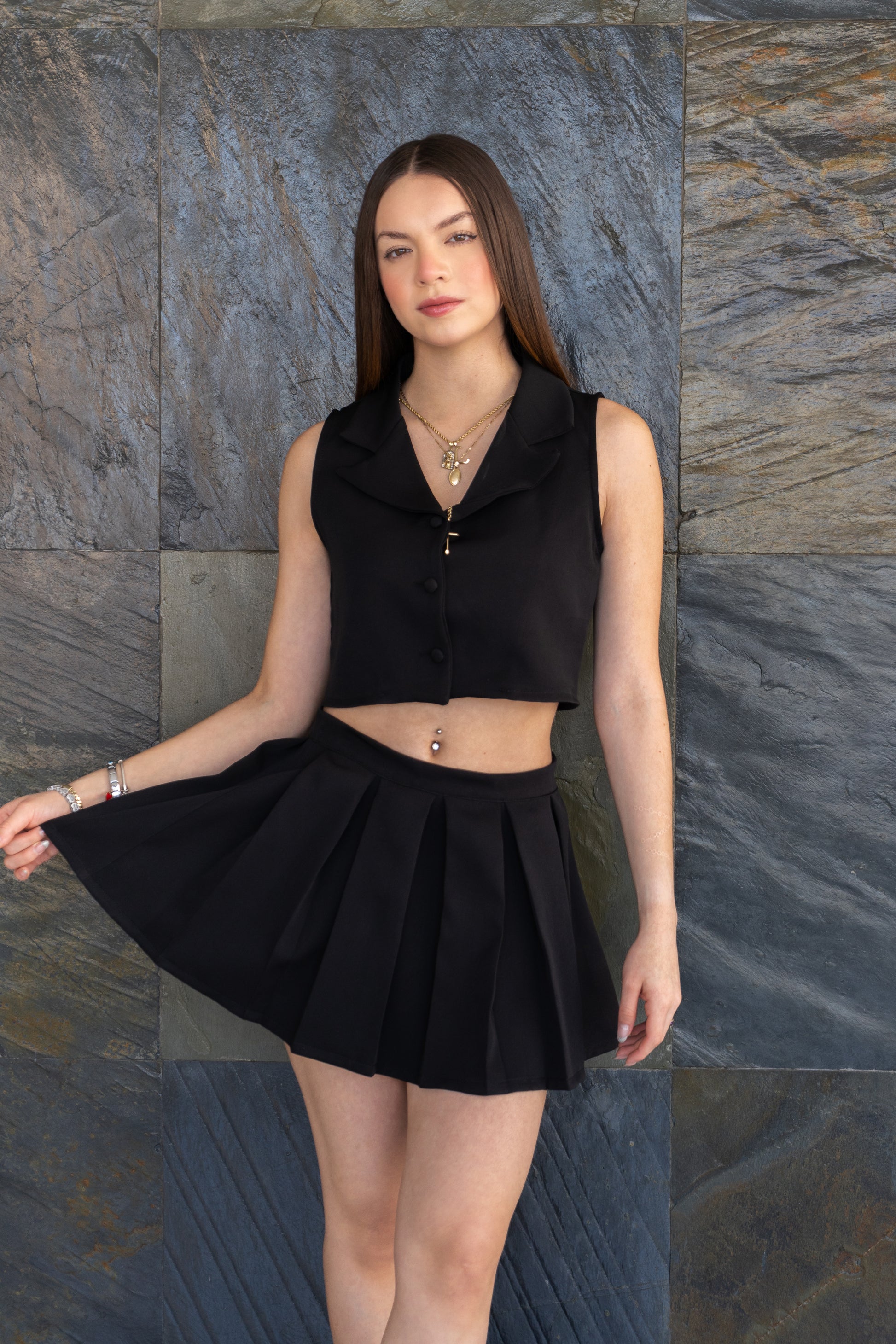 Set chaleco + falda negra