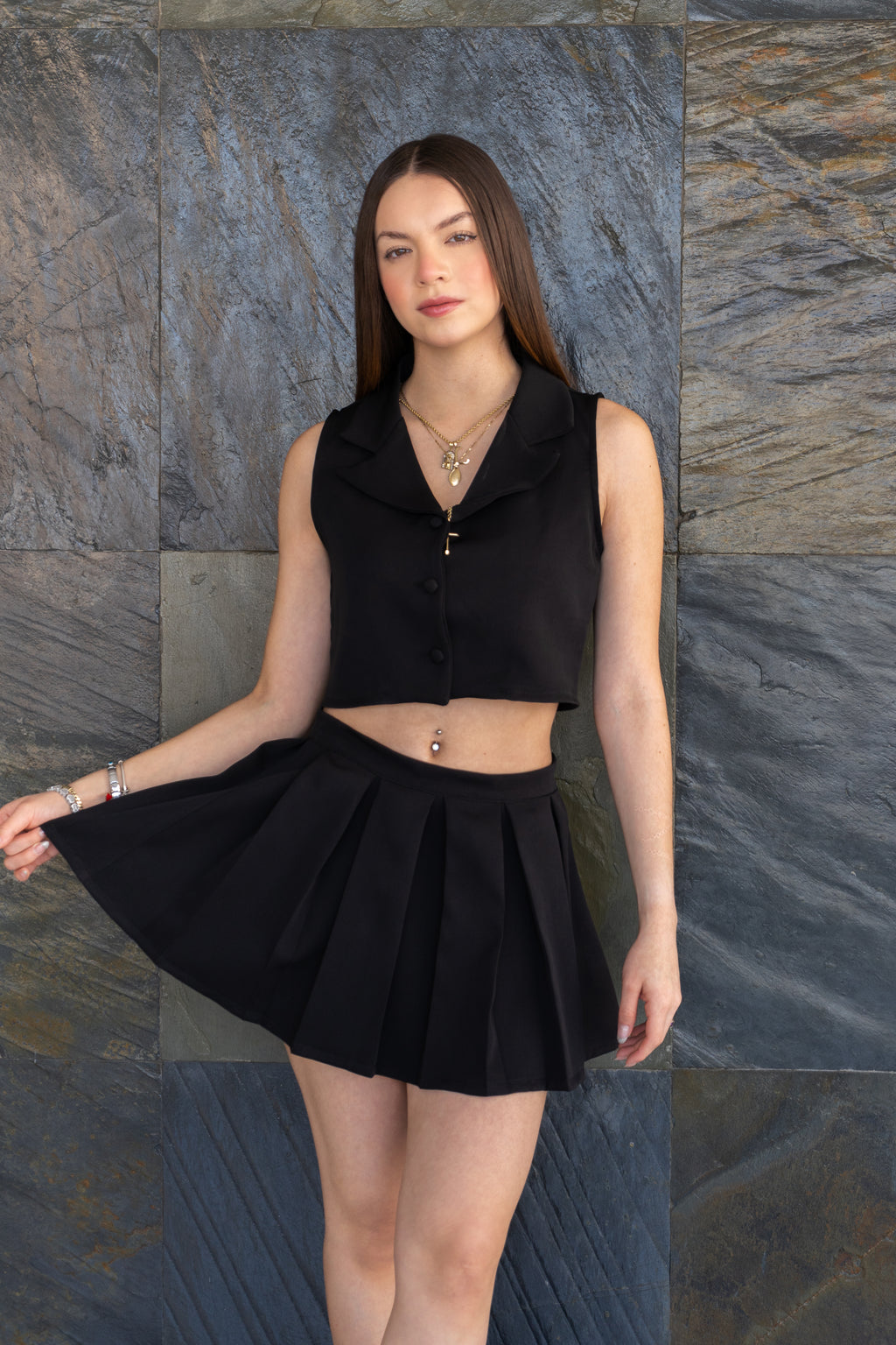 Set chaleco + falda negra